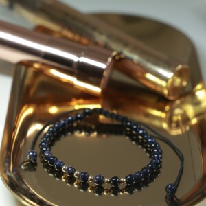 Blauwe goudsteen armband met 14 karaat geelgouden kralen