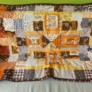 Oranje patchwork deken