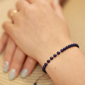 Stijlvolle Lapis lazuli armband met 14 karaat geelgouden kralen