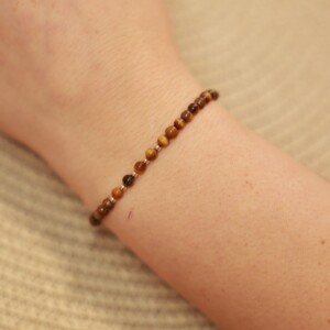 Tijgeroog armband met 14 karaat geelgouden kralen van 2,5 mm