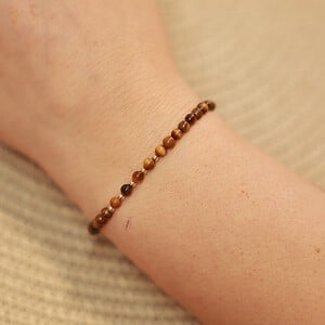 Tijgeroog armband met 14 karaat geelgouden kralen van 2,5 mm