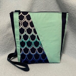 Blauw / mintgroene schoudertas