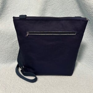 Blauw / mintgroene schoudertas