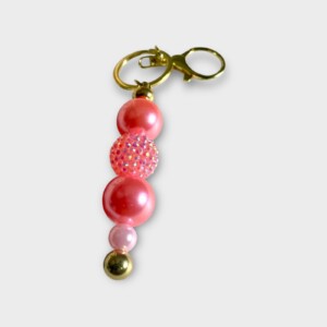 Handgemaakte Kralen Sleutelhangers – Stijlvol in Goud, Wit, Fuchsia & Roze