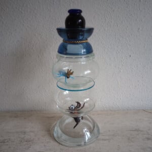 SPIN  in de AANVAL glasobject met kandelaar functie