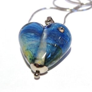 Ketting glaskraal hartje blauwgroen met zirconia's