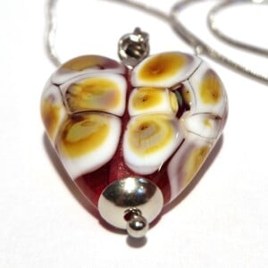 Ketting glaskraal hartje roze met multicolor roze