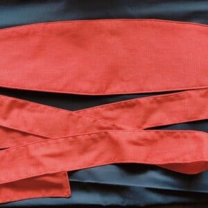 Linen rode riem