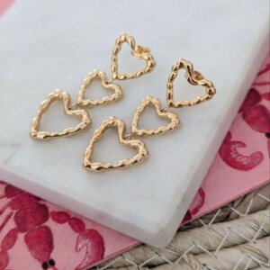 Triple heart oorbellen goud