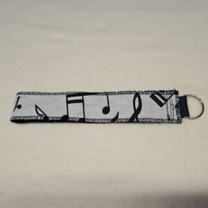 Sleutelhanger met muzieknoten print