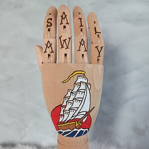 Tattoo hand zeilschip