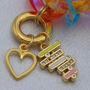 Acryl schakelarmband met vergulde onderdelen - multicolor