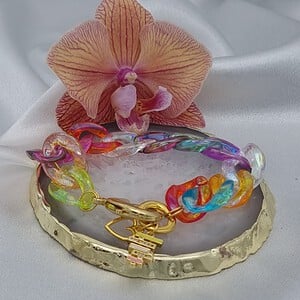 Acryl schakelarmband met vergulde onderdelen - multicolor
