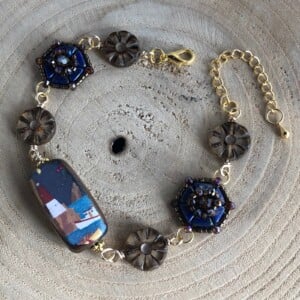 Vuurtoren armband met inspireerende text "be a lighthouse in someone elses storm"