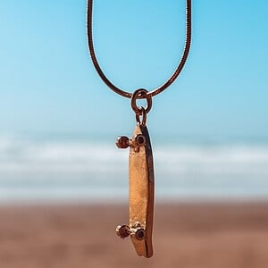 Oceaan Surfskateboard ketting goud