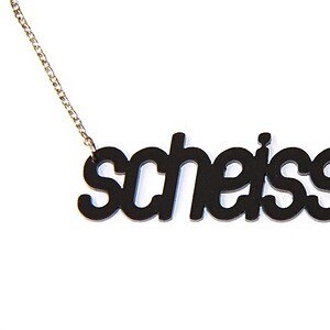 Scheisse! naamketting