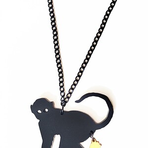 The Golden Turd ketting (aapje)