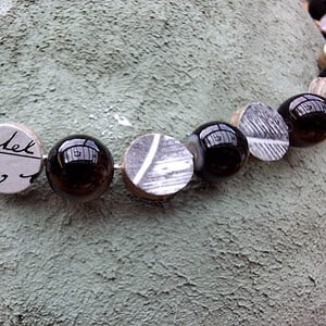 (heren of dames) ketting met kolenmijn verleden, papier en glas