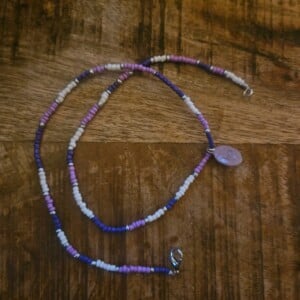 Gekleurde kralen ketting met bedel
