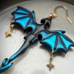 Draak oorbellen - glimmend blauw en zwart