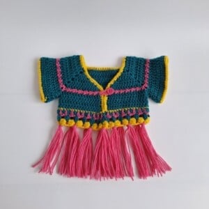 Gehaakt baby vestje | Petrol, roze en geel met roze franjes