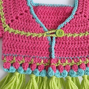 Gehaakt baby vestje | Roze, turquoise en groen met groene franjes