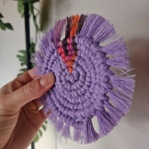 Paars/roze macrame onderzetter