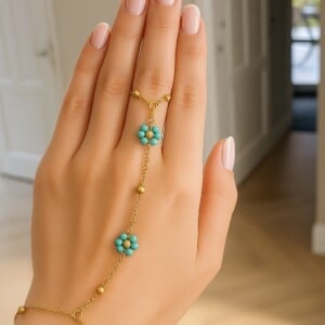 Vinger armband  goud en turquoise
