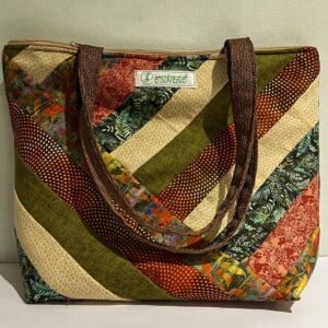 Handgemaakte tas met uniek stroom en kleuren