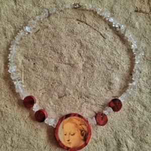 Ketting met papieren hanger, Madonna van Rafaël.