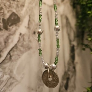 Kralenketting met muntje