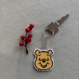 Geborduurde sleutelhanger Winnie de Pooh