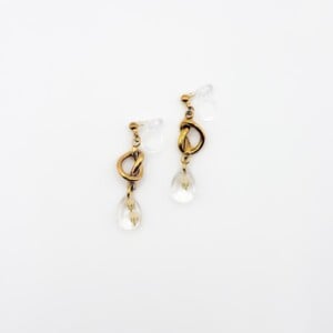 Sculpturele Knoop Oorbellen met Druppelvormige Hangers Gevuld met Echt Gipskruid (The Classics)