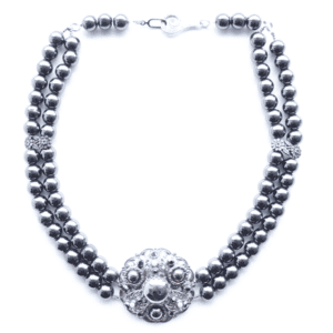 Hematite statement necklace with vintage brooch