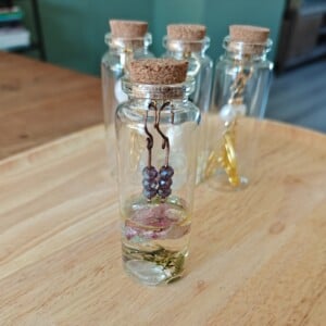 Unieke oorhangers in flesje