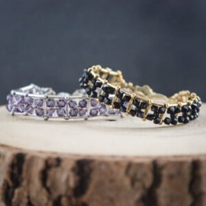 Gouden schaduw & Maanlicht, statement armband met glas kristallen