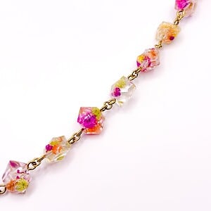 Armband met Kristalvormige Hangers Gevuld met Echt Gipskruid uit Den Haag (Fleur de Soleil)