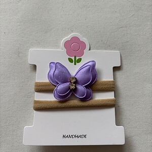 Baby haarbandje met vlinder