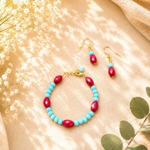 Blauwe en rode glass armband/oorbellen set
