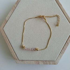 Goudkleurige Slangen Schakelarmband met Roze Facetkralen – Verstelbare Damesarmband