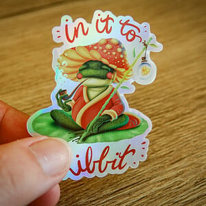 In it to ribbit holografische sticker 5,8x7cm