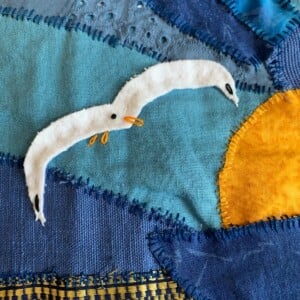 Patchwork wandkleed met meeuwen
