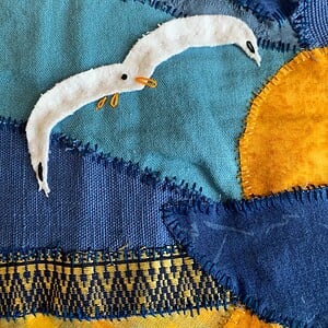 Patchwork wandkleed met meeuwen