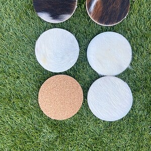 Set van 6 onderzetters van echte koeienhuid 9cm