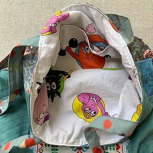 Totebag met geborduurde molen en Barbapa voering