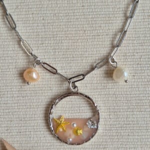 Zilveren schakelketting met opvallende bedel | Coral