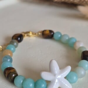 Zomerse zeester armband goud