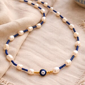 Cheshm-e Aman | ketting met boze oog bescherming en zoetwaterparels
