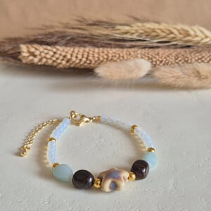 Gouden armband keramieken zeester