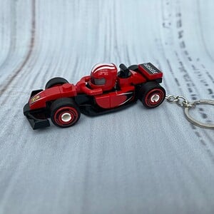 🏎️ Jouw sleutels altijd op Pole Position! 🏎️